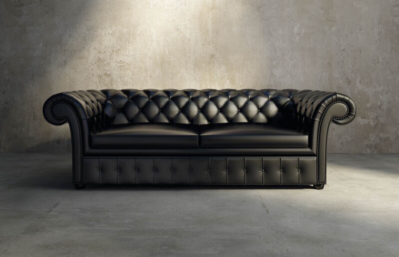 pavimento in cemento e divano